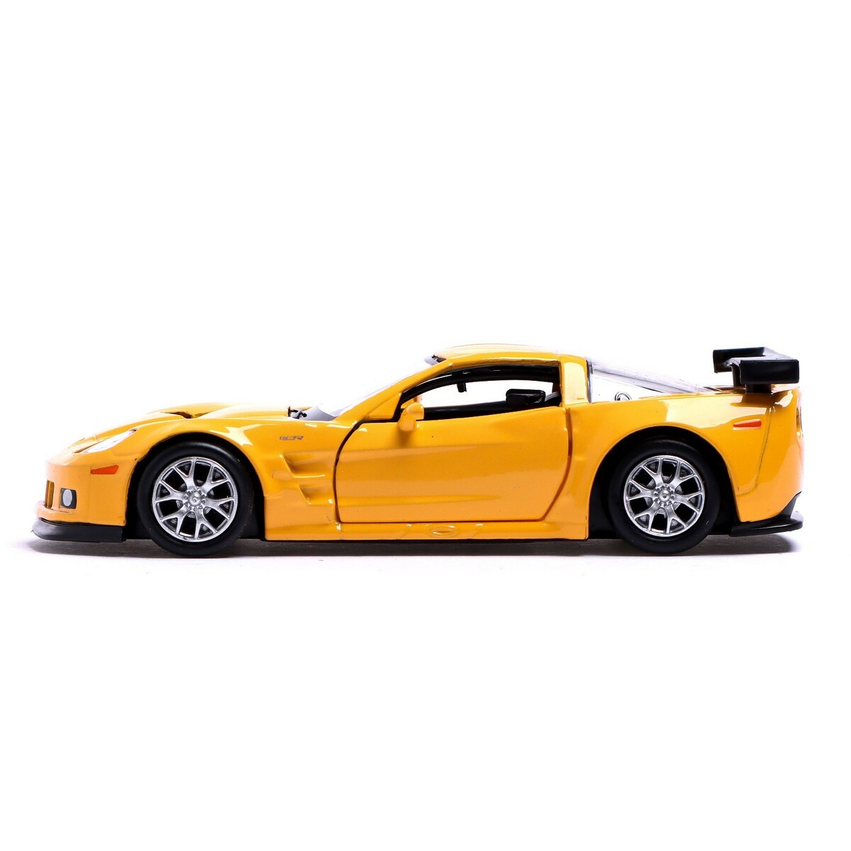 Машина металлическая chevrolet corvette c6-r, 1:32, открываются двери, инерция, цвет желтый фото