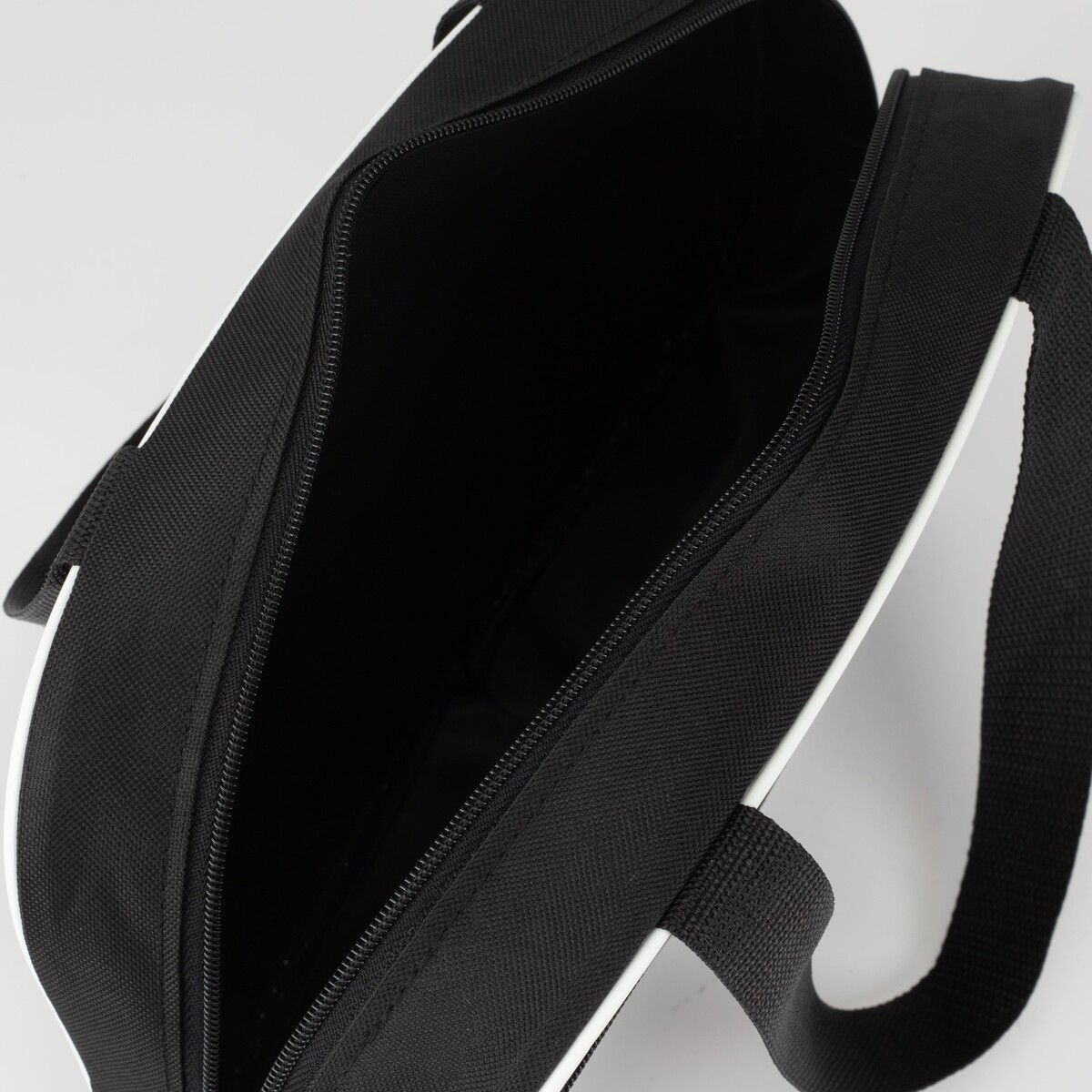фото Сумка для обуви на молнии, наружный карман, цвет черный textura