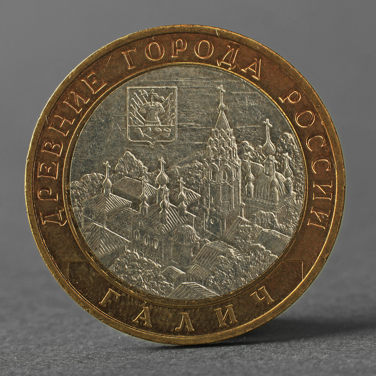 

Монета