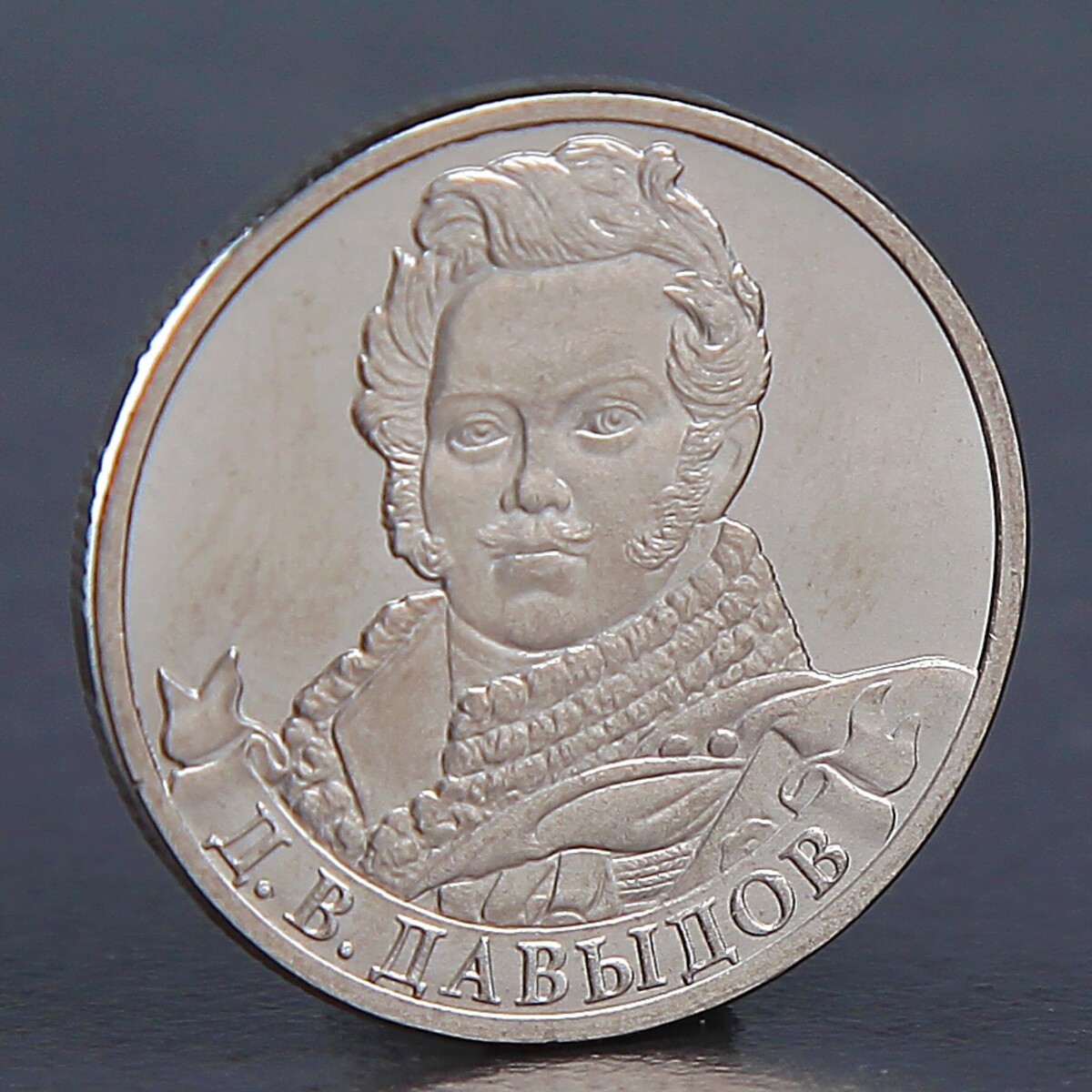 

Монета