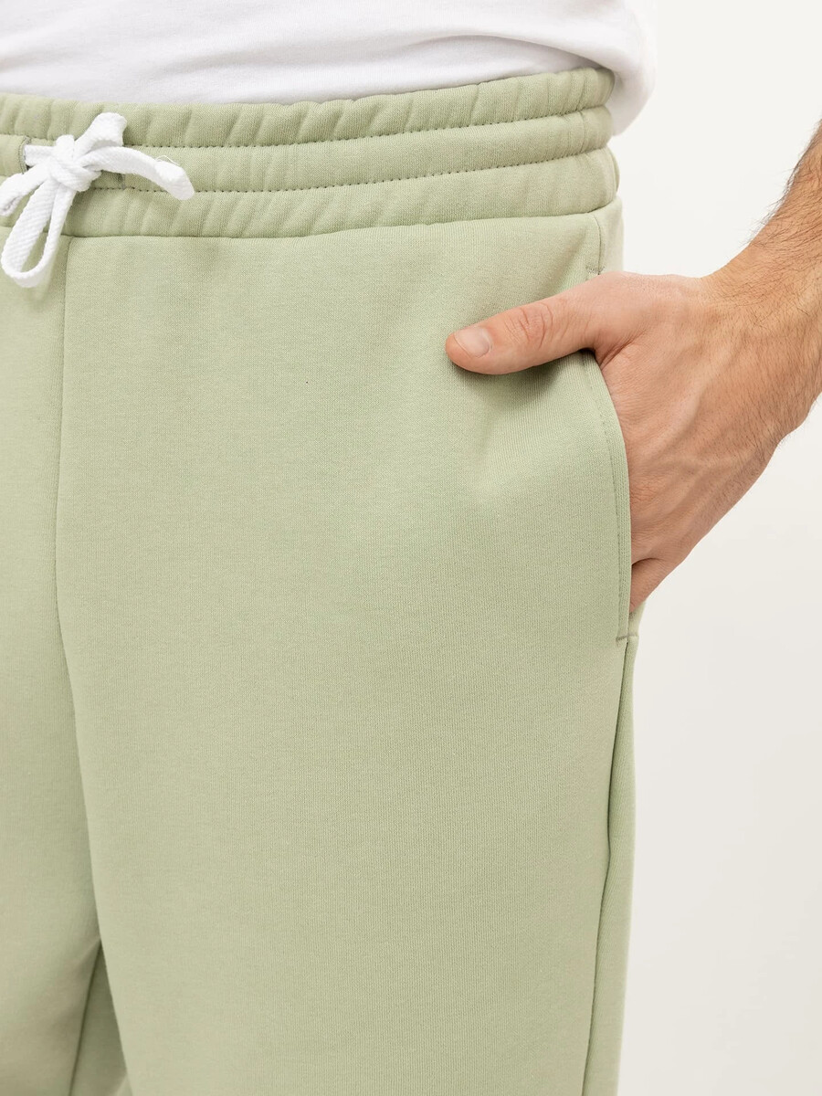 фото Теплые брюки-джоггеры мужские в зеленом оттенке mark formelle