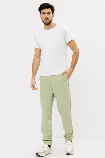 Теплые брюки-джоггеры мужские в зеленом 