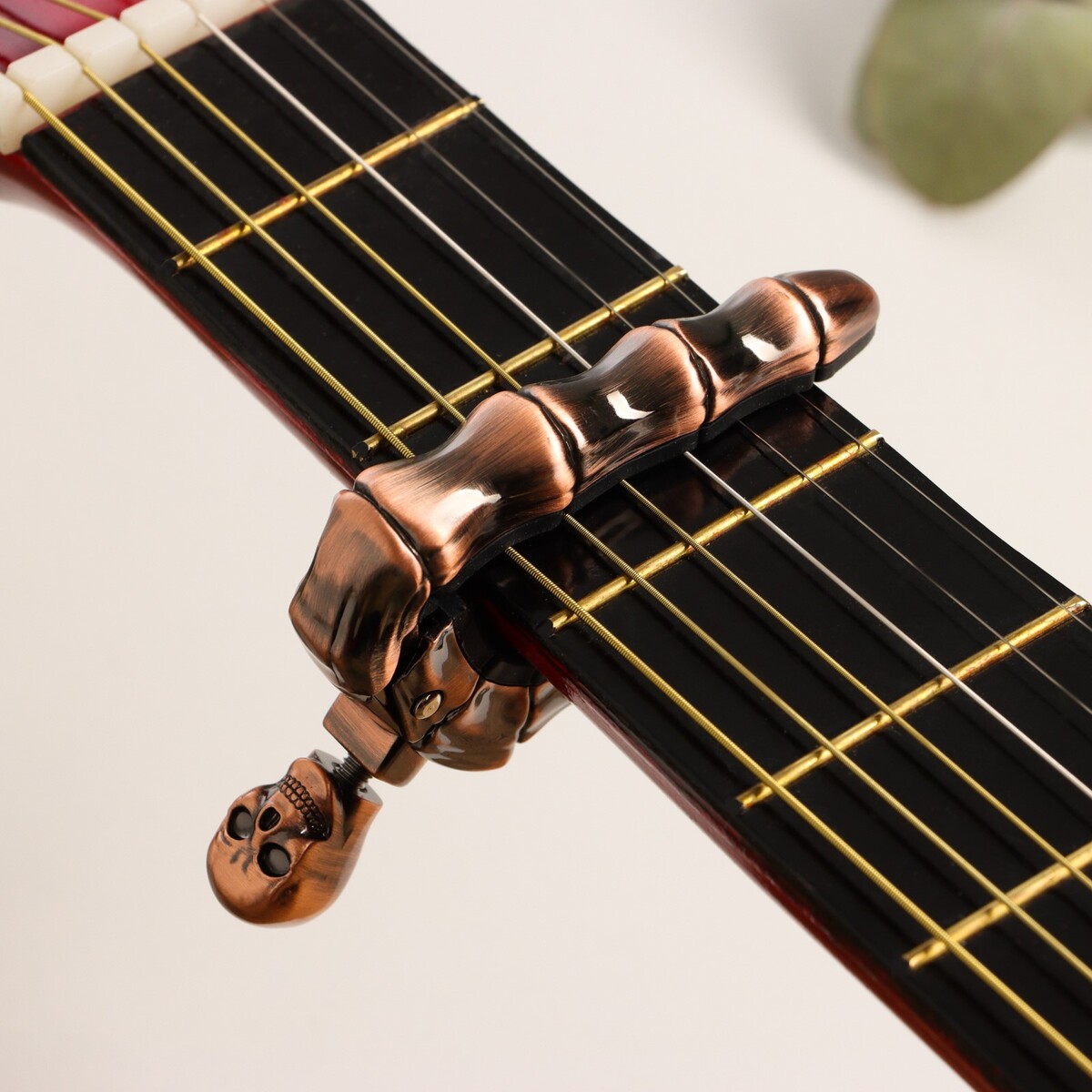 Каподастр для гитары music life череп, бронзовый рогатка яигрушка череп майя 10332051